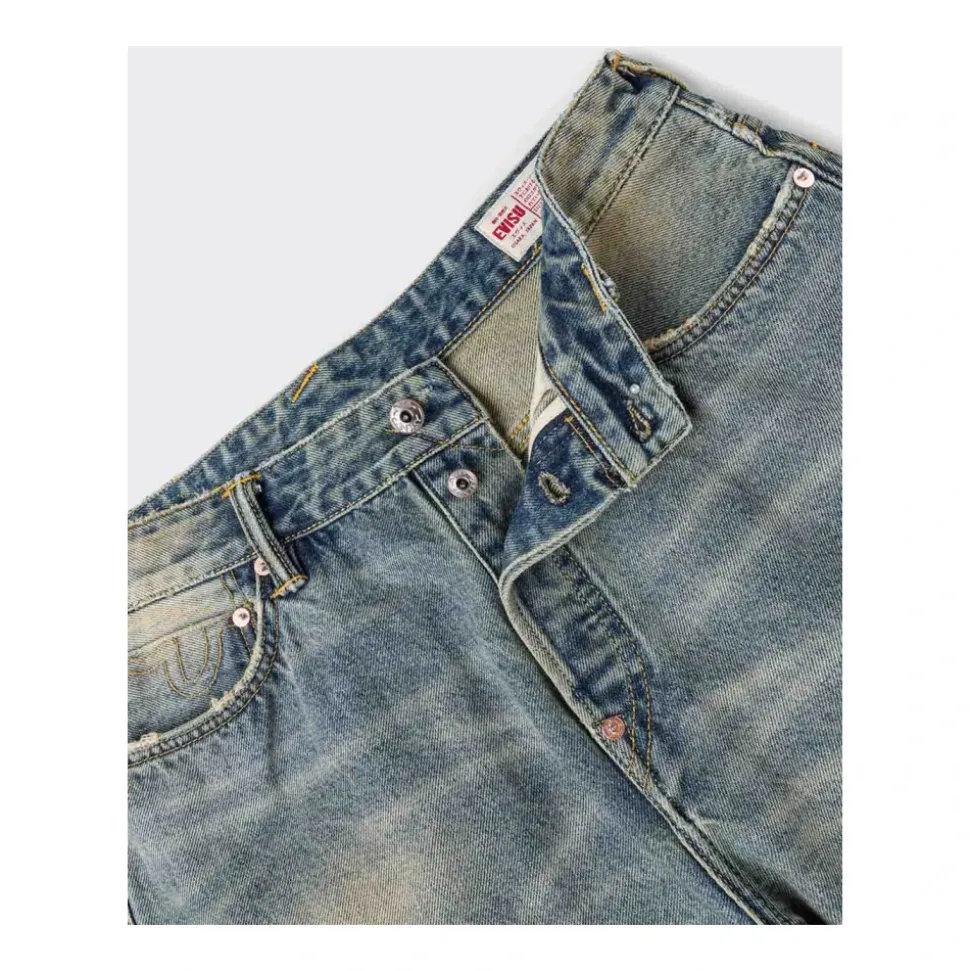 7-lommers jeans med måkebroderi