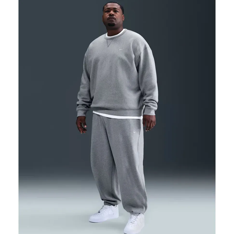 Solo Swoosh Cuffed Fleece Pants