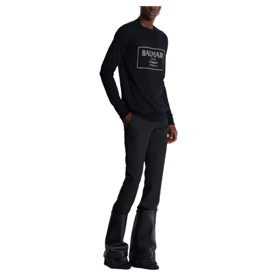 Strikket genser med Couture-etikett