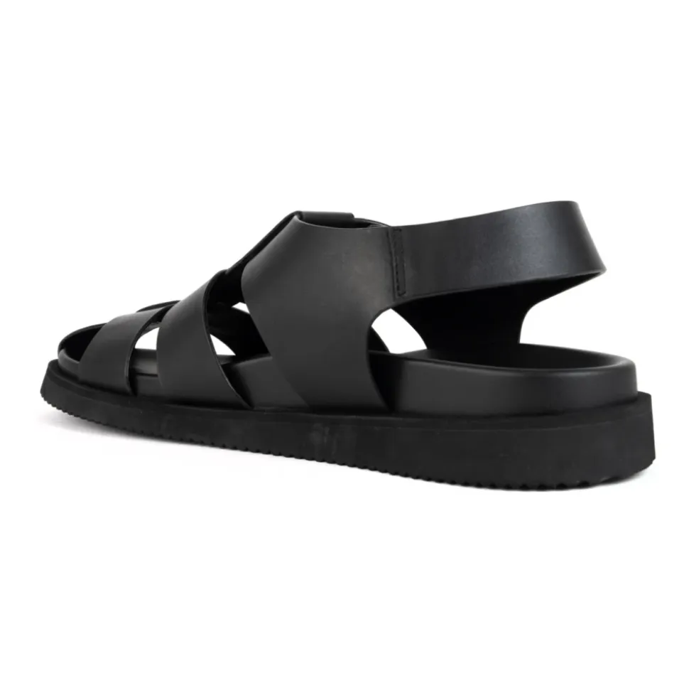 Svarte, avslappede, flate sandaler